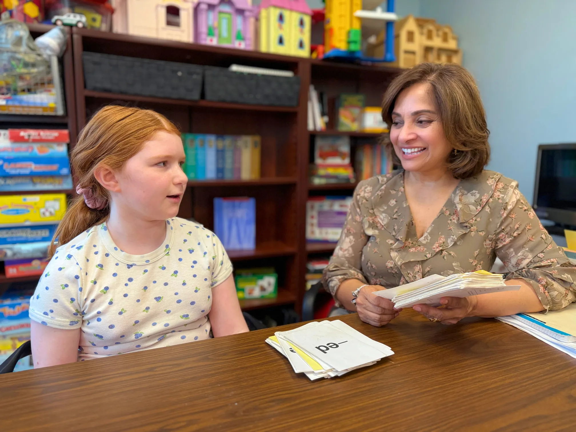 Rebecca Thomas SLP with student